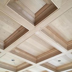 wood paneled ceiling with recessed lighting in an empty room