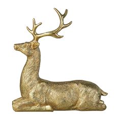 a golden deer statue sitting on top of a white background