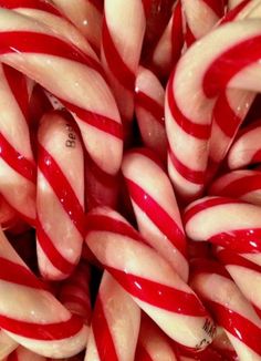 a pile of candy canes sitting on top of each other