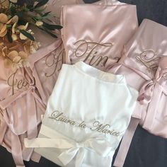 Personalized Bride & Bridesmaid Robe, Embroidered Bride Kimono It is the perfect Bridesmaids' gifts ! Our gorgeous silk robes are the perfect item to gift to your bridal party. Everyone from your maid of honor to the Mother of the Bride will love these! They are the perfect item to slip on and wear while getting ready for the big day! These stunning Personalized satin Bridal party robes make the perfect addition to your wedding photos. PRODUCT DETAILS - Color Options: White & Pink - Size: Small Bride Kimono, Bridesmaids Gift Sets, Matching Robes, Bridal Party Robes, Personalized Bride, Wedding Gift Boxes, Bridesmaid Robes, Team Bride, Draped Fabric