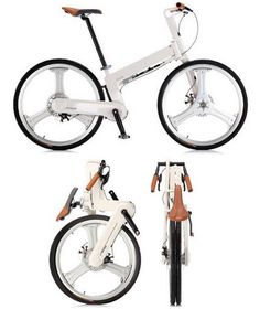 three different views of the same bike with wheels and spokes, all in white