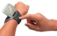 two hands holding onto a cell phone with a gps app on it's wrist