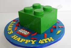 a birthday cake made to look like a lego block