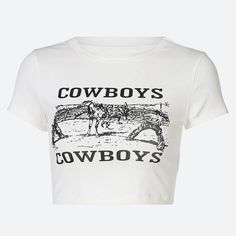 Capture the essence of the Old West with this cropped tee, adorned with a classic cowboy scene. It's a casual yet bold homage to the rugged spirit of yesteryear, perfect for contemporary streetwear with a vintage twist. Cropped design Print & text details at front Crew neck Short sleeve Polyester, spandex Crop Pullover, Shirts Crop, T Shirt Crop Top, Short Sleeve Crop Top, Cowboys Shirt, Streetwear Tops, Casual Summer Shorts, Summer Crop Tops, Cropped Tops