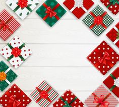 christmas presents laid out on top of each other with bows and ribbons around the edges