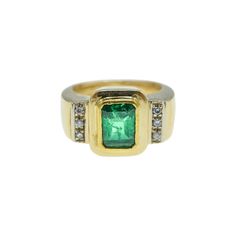 18 kt., One emerald-cut emerald ap. 1.40 ct., 6 round diamonds ap. .10 ct., ap. 6.2 dwts. Size 7 Emerald: medium-deep green color saturation, well-cut. Diamonds: VS-SI/J-K-L SKU#R-02833 Luxury Emerald-cut Diamond Signet Ring, Blue Star Sapphire Ring, Star Sapphire Ring, Blue Star Sapphire, Emerald And Diamond Ring, Emerald Diamond Ring, Star Sapphire, White Gold Engagement, Emerald Stone