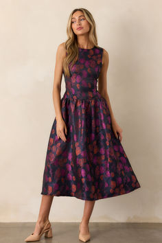 Indulge in the carefree and whimsical beauty of the Windswept Garden Floral Sleeveless Midi Dress. Perfect for any occasion, this dress boasts a stunning floral print and a flattering fit that will turn heads. Embrace your inner romantic and add this must-have piece to your wardrobe today! This purple dress features a floral design, a high rounded neckline, a sleeveless cut, a discrete back zipper with laced back detailing, a midi length and drop waistline. Women Club Dresses, Garden Purple, Dresses Birthday, Midi Dress Floral, Halter Bridesmaid Dress, Rush Dresses, Elegant Dresses Long, Black Dresses Casual, Little White Dresses