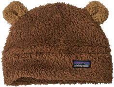 Keep your baby bundled from head to toe in the soft and adorable Patagonia® Furry Friends Hat. Created with polyester high-pile double-face fleece, this hat features bear-cub-style ears for extra cuteness. The double layer fabric adds warmth for a fun and fuss-free day playing in the leaves or enjoying the soft snow. Pair your little snow cub with a double-layer jacket and some booties for ultimate warmth this season. FEATURES: Bear cub style hat Regular fit High-pile double-face fleece Cub ears Patagonia Baby, Baby Patagonia, Fleece Hats, Kids Winter Hats, Patagonia Kids, Fleece Hat, Cozy Hat, Fabric Headbands, Toddler Hoodie