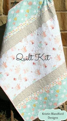 the quilt kit is hanging up outside