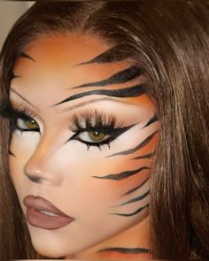 https://www.instagram.com/p/C_Je_sMyQSy/?igsh=MzRlODBiNWFlZA== Cute Tiger Costume, Tiger Outfit Halloween, Big Cat Halloween Costume, Animal Print Halloween Makeup, Women Tiger Costume, Tiger Stripe Makeup, Lepord Makeup Women, Animal Make Up Ideas, Halloween Costume Animals