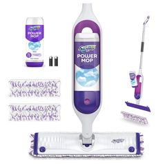 a purple and white mop with cleaning supplies around it