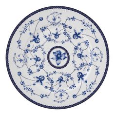 an ornate blue and white plate with flowers on the rim is shown in front of a white background