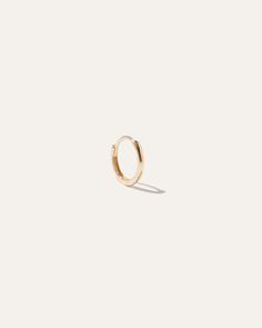 14k Gold Solo Mini Hoop | Quince Small Gold Hoops, Bezel Necklace, Mini Hoop Earrings, Professional Jewelry, Everyday Earrings, Bezel Diamond, Gold Diamond Rings, Gold Hoops, Gold Hoop