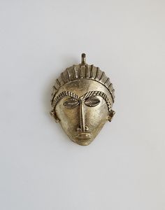 A very well made LARGE beautiful Ghana Ashanti brass mask pendant,  It measures 2.25 inches wide by 3.25 inches long including bail. Item#S4152-60 Exact metal content is unknown.  This pendant was made using the lost wax method. Due to the handmade nature some imperfections are to be expected. Lost Wax, Brass Pendant, Ghana, Handmade Natural, Selling On Etsy, Sell On Etsy, Etsy Seller, Unique Gifts, Wax