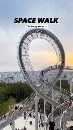 people are walking up and down the roller coaster at space walk in puhang korea