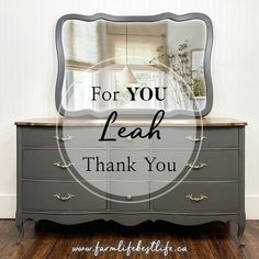 a dresser with the words for you to teach thank you on it in front of a mirror