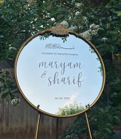 a mirror with the words maryam and shari written on it