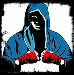 an image of a man with boxing gloves on his hands and wearing a hoodie