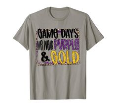 a gray t - shirt with the words game days, we wear purple and gold