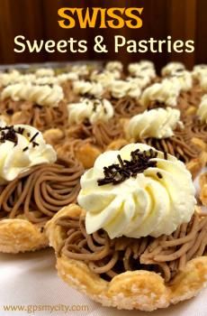 sweet pastries with white frosting and chocolate sprinkles