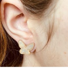 ♦ Gold Butterfly Stud ♦ Our boho earrings featuring a white iridescent butterfly is sure to capture attention when glistening in the sunlight, making them absolutely brilliant! ♦ White Butterfly Earrings ◇ MOP Earrings ◇ Wife Gifts ♦ Materials: White Shiny Shell * 14K Gold Plating ♦ Closure: Push Back OTHER ◇ INFORMATION ♦ Each pair is handcrafted with white shiny shell and plated in 14K gold. ♦ Our Mini Butterfly Stud Earrings are a brilliant way to show off your boho casual vibes. ♦ They make Delicate White Earrings For Pierced Ears, Delicate White Pierced Earrings, Dainty White Earrings, Delicate White Nickel-free Earrings, Dainty White Drop Earrings, Dainty White Hypoallergenic Earrings, Delicate Nickel-free White Earrings, Nickel Free White Butterfly Earrings, White Dainty Butterfly Earrings