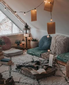 a living room filled with lots of furniture and decor on top of a white rug