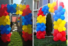 there are balloons in the shape of an arch on the lawn and one is red, white, blue, and yellow