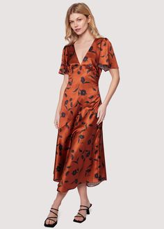 Elevate your style with the Sepia Dahlia Midi Dress, where rich deep red meets navy blue floral elegance! The flattering deep V-neck and fluttering short sleeves complement the slim silhouette, making it a versatile and chic addition to your wardrobe. Style # WDWC23009 Imported Model is 5 ft 9 inches; Bust: 32", Waist: Orange Midi Dress, Midi Short Sleeve Dress, Brown Floral, Floral Dress Black, Wedding Bridesmaids, Deep Red, Deep V Neck, Empire Waist, Flutter Sleeve