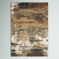 an area rug with different colors and textures