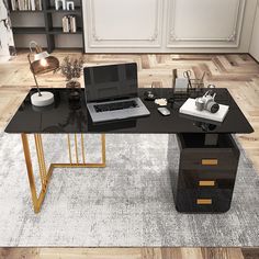 an office desk with a laptop and other items on it in front of a bookshelf