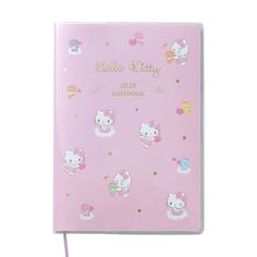 the hello kitty notebook is pink and has gold foil on it, with little kittens