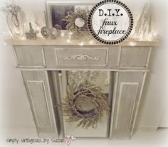 an old dresser with wreaths and lights on it's top is decorated for christmas