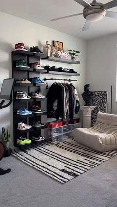 a living room filled with lots of furniture and shelves full of shoes on top of them