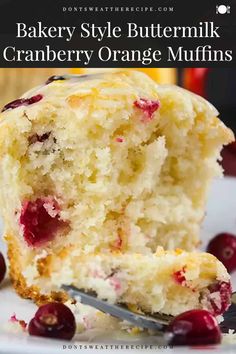 a close up of a piece of cake on a plate with cranberry orange muffins