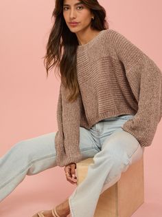 With a plush chenille fabric, this sweater offers a soft texture that's perfect for transitioning seasons. Its unique block stitched pattern creates a relaxed fit that ensures a cozy and flattering look, while the cropped length makes it ideal for pairing with high-waisted bottoms. Staple Sweaters, Fancy Sweater, Oversized Cropped Sweater, Cropped Sweaters, Dolman Sweater, Simple Wardrobe, Cute Everyday Outfits, Chenille Fabric, Outfit Inspo Fall