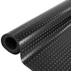 a black and white photo of a roll of carbon fiber fabric on a white background