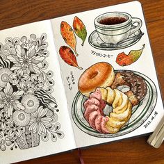 an open coloring book with food on it