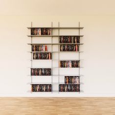 Wall Mounted DVD Storage Shelving Blu Ray Storage, Blu Ray Collection, Minimize Clutter, Dwell Magazine, Dvd Storage, Storage Shelving, Deep Shelves, Frame Shelf, Modern Shelving