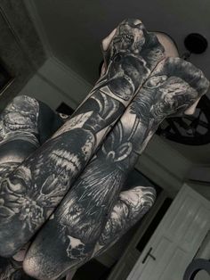 a man with tattoos on his arm and arms