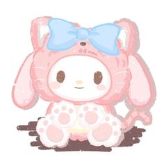 a pink bunny with a blue bow sitting on the ground