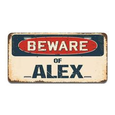 an old metal sign that says beware of alex on the front and back of it