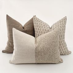 four pillows stacked on top of each other