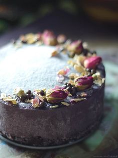 there is a chocolate cake with flowers on it