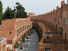 an aerial view of a brick building with lots of windows