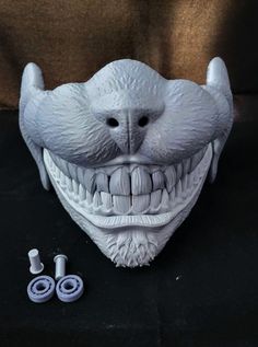 3D printed DIY Half mask designed and printed by artist Justin Shifflett. Item comes with mask, pins and bearings for the moveable jaw. Item is unfinished. Mask is printed in plastic and is both strong and light weight. Free free to message with any questions. Mask can be sized to fit if you give me a measurement for the width of your face when ordering. Color of finial printed piece may very. Cheshire Cat Mask, Mask With Moving Jaw, Diy Cheshire Cat, Halloween Cat Design Masks And Prosthetics With Cat Ears, Cyberpunk Cat Mask, 3d Print Mask For Cosplay, 3d Printed Fursuit Head, 3d Printed Mask For Cosplay, Diy Chat