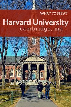 two people walking down a path in front of a building with a red banner over it that says what to see at harvard university cambridge, ma