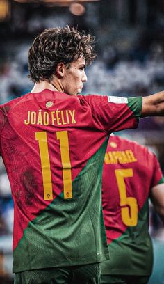 two soccer players in red and green uniforms with their arms around each other's shoulders