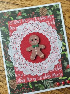 a christmas card with a ginger bear on it's front and the words merry christmas