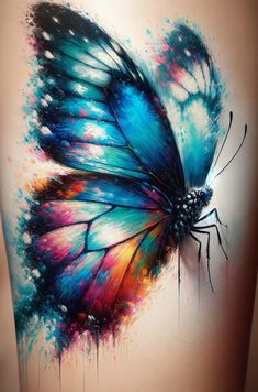 a colorful butterfly painted on the back of a woman's stomach