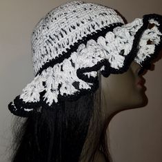 Woman's Crochet White And Black Cotton Floppy Hat. 100% Cotton. Adjustable White Crochet Bucket Hat, White Adjustable Crochet Bucket Hat, Handmade Black Crochet Hat For Beach, White Wide Brim Crochet Hat One Size, White Crochet Bucket Hat, One Size, White Bohemian Crochet Hat For Vacation, Adjustable Black Crochet Hat For Beach, Adjustable Black Crochet Hat For The Beach, Handmade White Bucket Hat For Spring